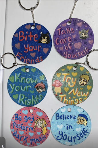 Hand-Painted Keychains with characters from Delicious in Dungeon - back view with quotes